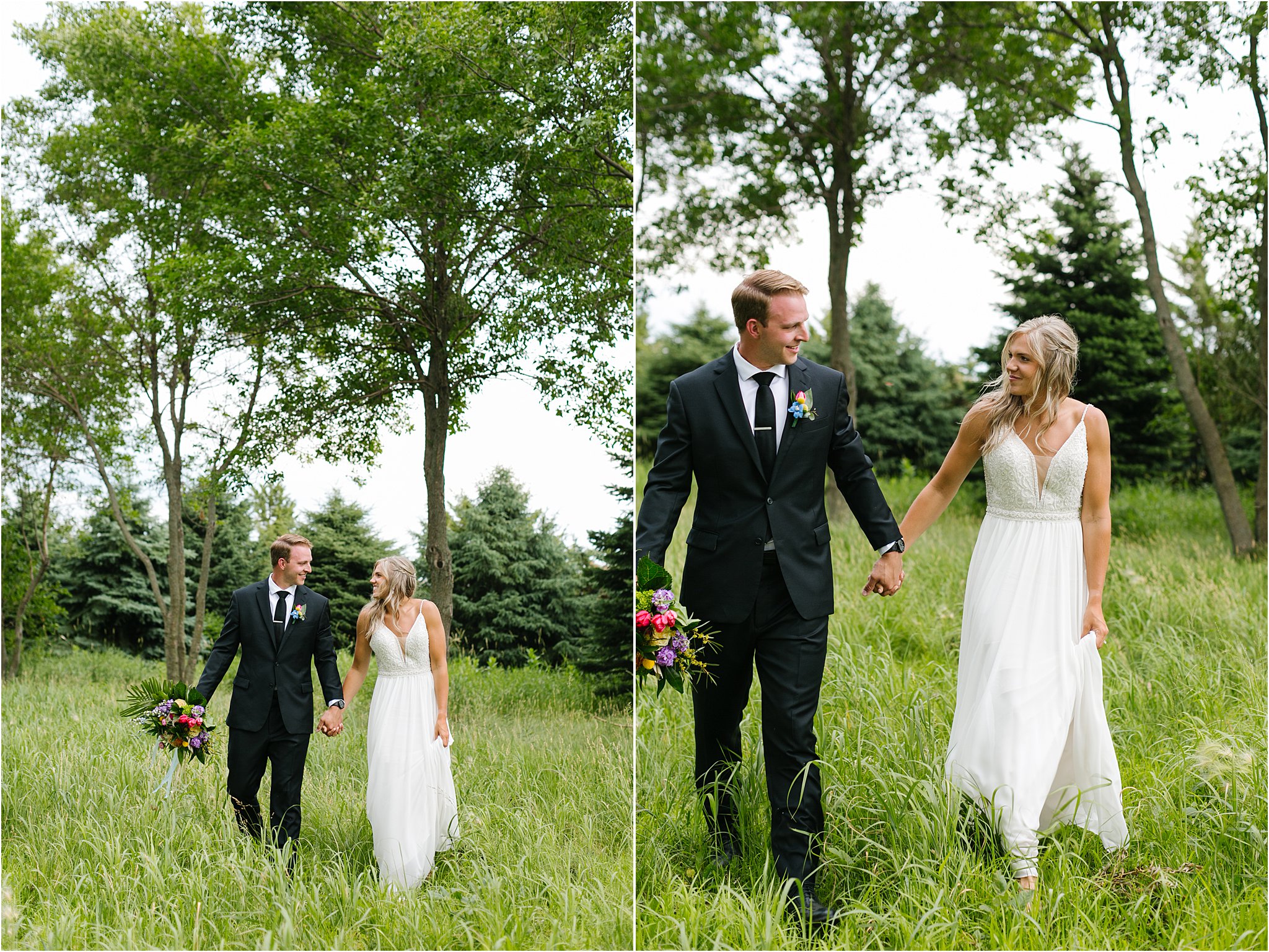 bride and groom walking through grass field
